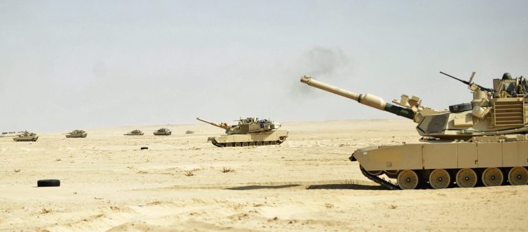 Abrams Main Battle Tank platoons position themselves on the battlefield in order to lay suppressive fire during Hammer Strike, a brigade level live-fire exercise conducted by the 3rd Armored Brigade Combat Team, 3rd Infantry Division, at the Udairi Range Complex near Camp Buehring, Kuwait, Wednesday. During the mission, the brigade combined ground maneuver, field artillery, attack aviation and Air Force assets to engage and destroy targets, displaying its lethal firepower to the many Kuwait military counterparts on hand. Hammer Strike was a culmination of the training the Sledgehammer Brigade and their Kuwaiti counterparts have been conducting for the past four months