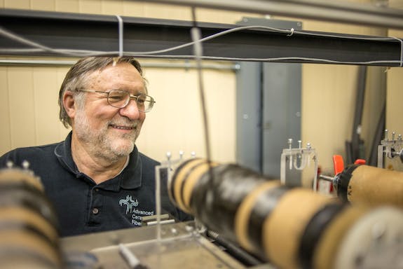 John with fiber spools