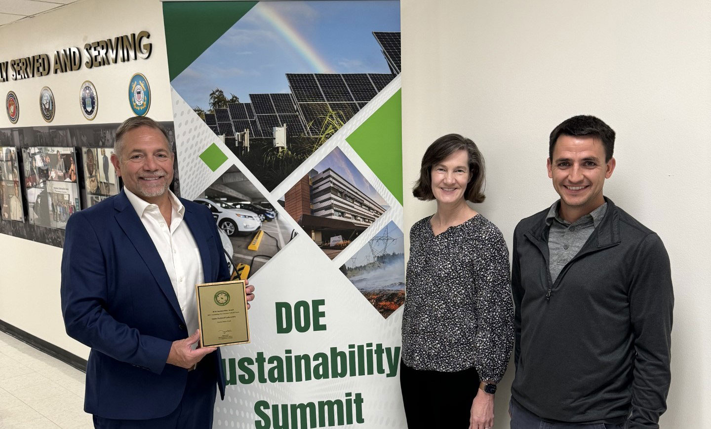 Ira Pray poses with the DOE Sustainability Award next to Sustainable INL Program Manager Maryl Fisher and INL Energy Manager Trevor Terrill in Washington, D.C.