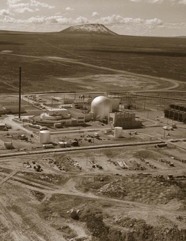 Argonne-West. EBR-II containment dome is to the right of the Fuel Cycle Facility. Middle Butte is on horizon.