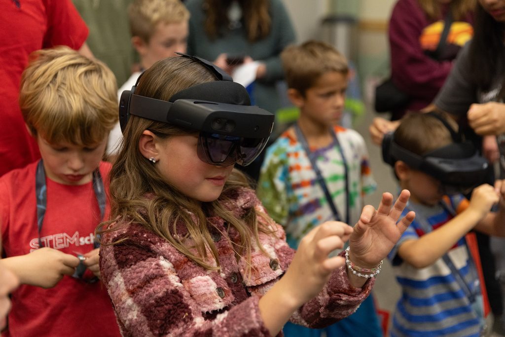 A student explores virtual reality at Family Nuclear Science Night.