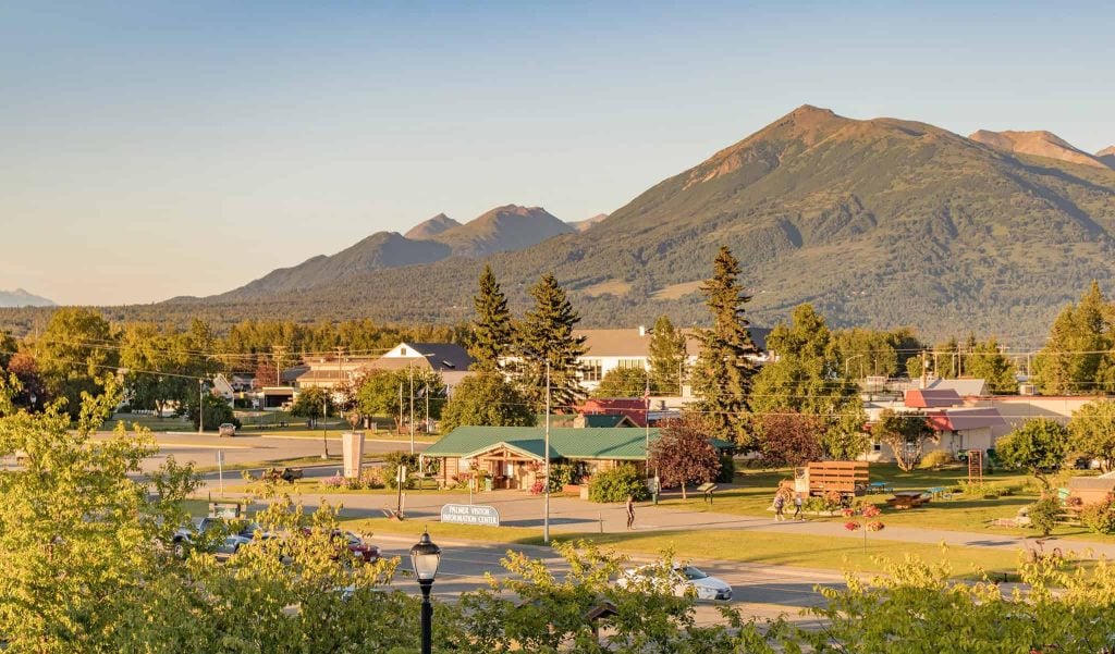 Palmer Visitor Information Center and a view of the Chugach Range in summertime, Palmer, Alaska, USA