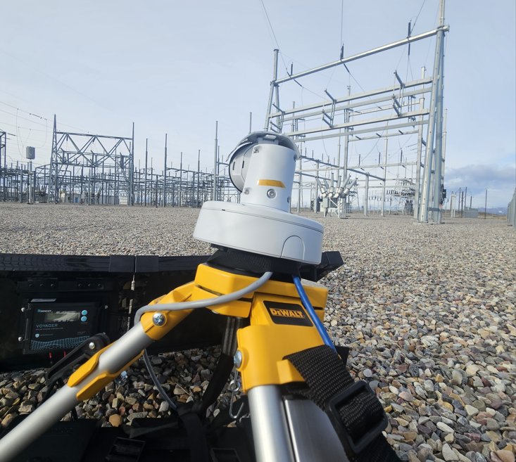 A substation in the background with a thermal camera centered.